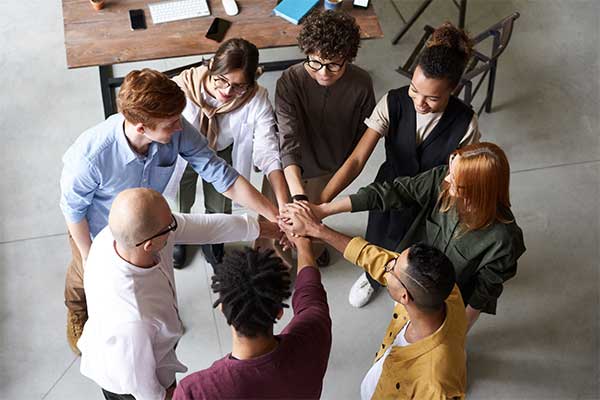 Professionals celebrating after choosing the right career package